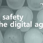 Rail worker hard hats hanging on a wall, with a blue layer over the front, with the words 'rail safety in the digital age' at the front of the image.